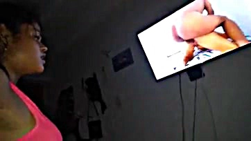 Man watches wife's explicit videos with black friend