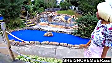 Black woman has sex at mini golf course