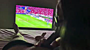 Newlywed wife sucks husband's cock during football match