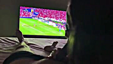 Newlywed wife sucks husband's cock during football match