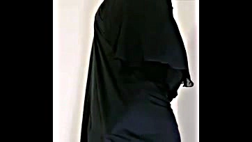 She's wearing a hijab, but her big ass is tempting