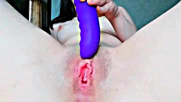 Woman experiences pleasure with new sex toy