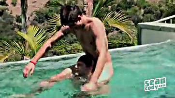 Two dudes get cocky and flirtatious by the pool