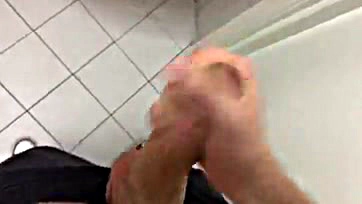 Dude jerks off in gym toilet, gets caught