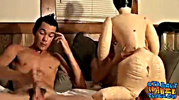 Young men pleasure themselves with a sex doll