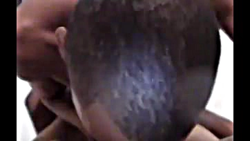 Two men engage in explicit, interracial oral and anal sex