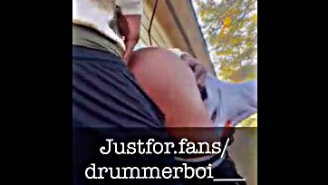 Two dudes anally penetrate Drummer Boi in the woods