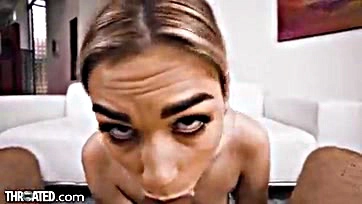 Blonde sucks cock deep into her throat